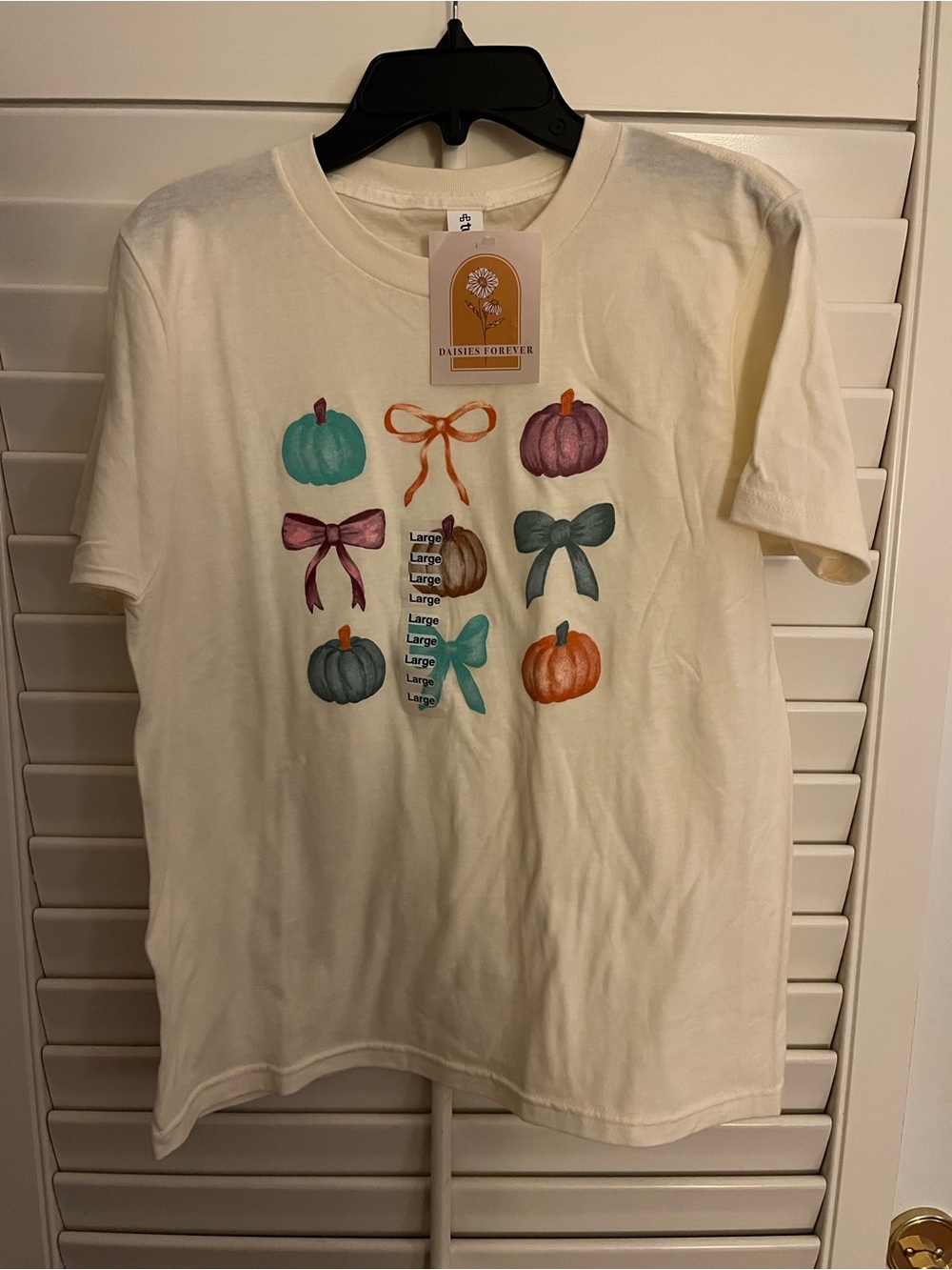Girl’s pumpkin bow tee